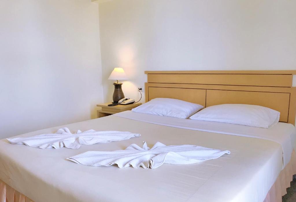 ห้องเตียงเดี่ยว โรงแรมมณีโรจน์